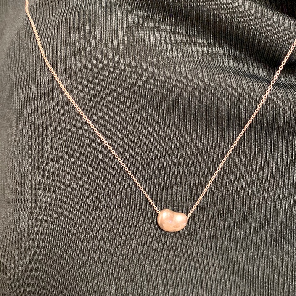 Tiffany bean necklace.  May just need some mild polishing but worn rarely.